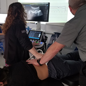 image Tonawanda chiropractic ultrasound imaging of spinal vertebrae during treatment